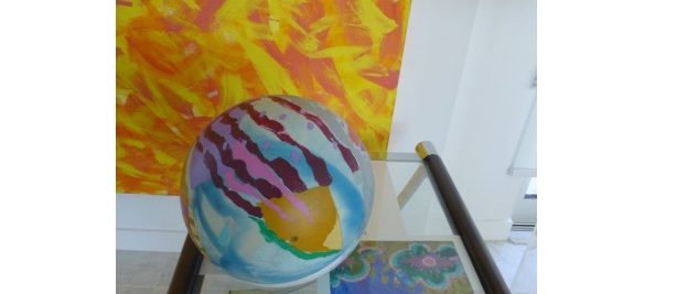 ball yellow painting glass table